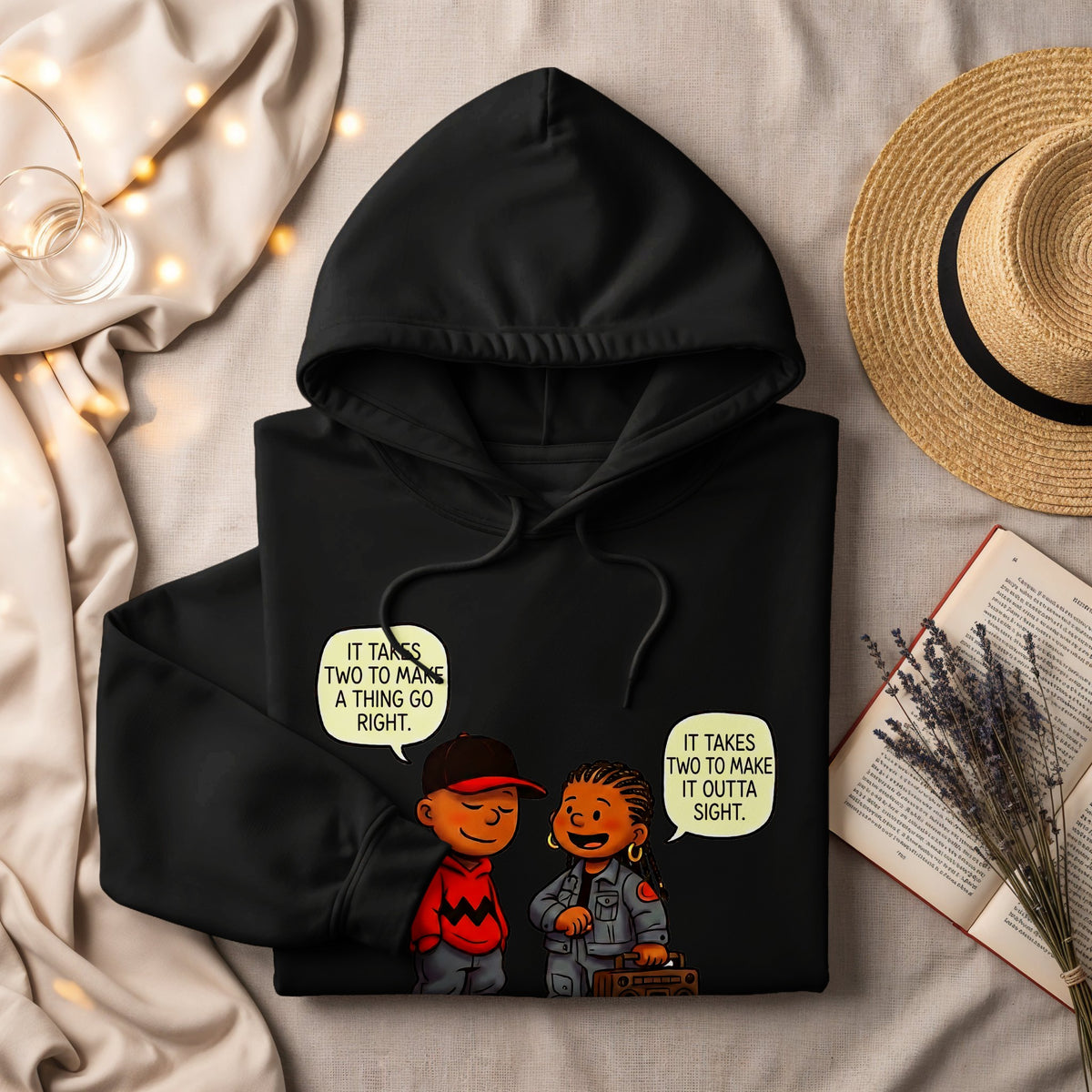 Black hoodie with cartoon characters and speech bubbles that read "It takes two to make a thing go right."