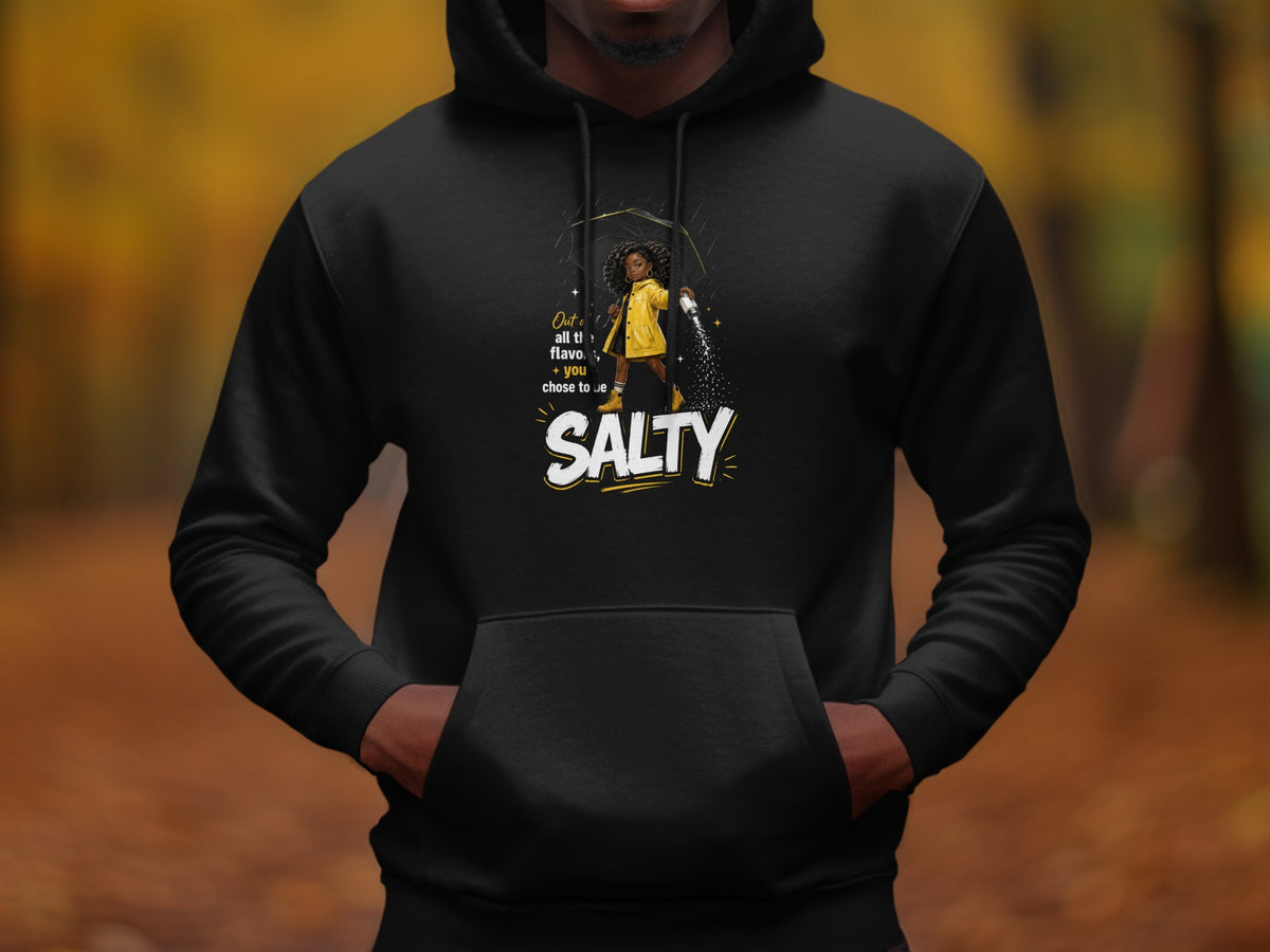 Black hoodie with graphic: girl with umbrella shaking salt shaker, text SALTY