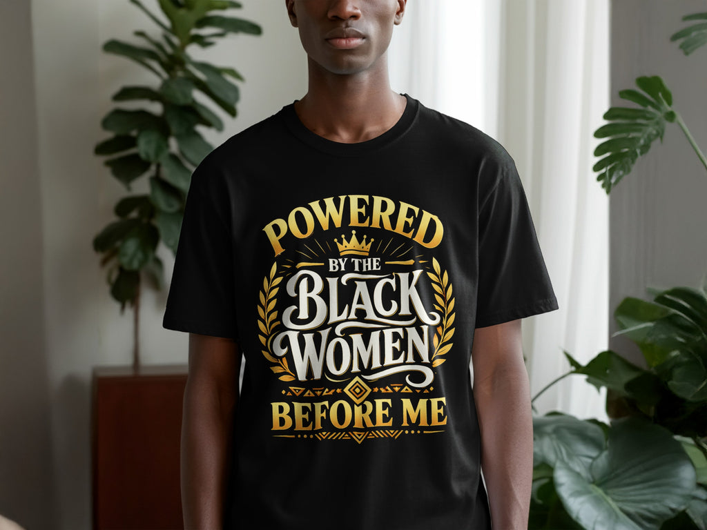 Black t-shirt with gold text: "Powered by the Black Women Before Me".