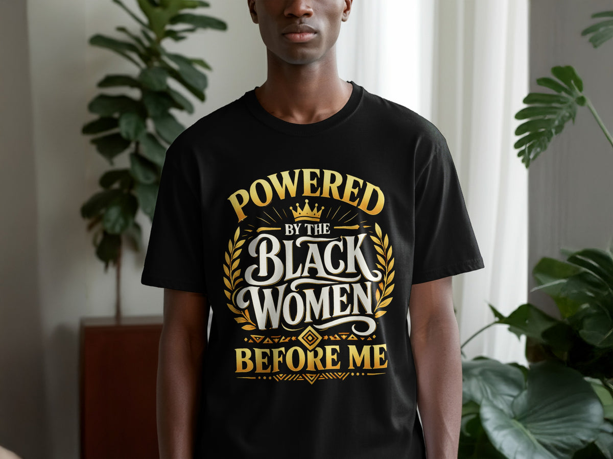 Black t-shirt with gold text: "Powered by the Black Women Before Me".
