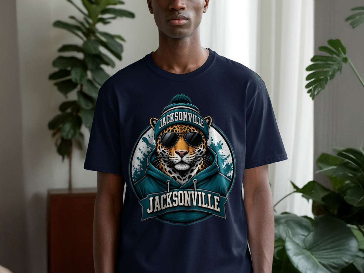 Navy t-shirt with a graphic of a jaguar wearing sunglasses and a beanie with "Jacksonville" text.