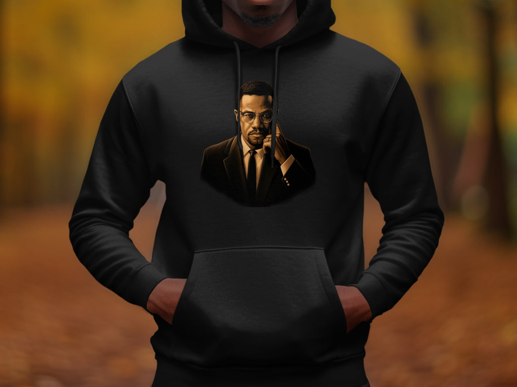 Black hoodie with a portrait of Malcolm X in a suit and glasses.