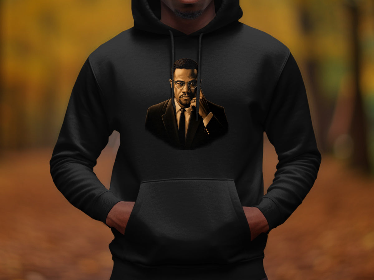 Black hoodie with a portrait of Malcolm X in a suit and glasses.