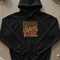 Black hoodie with "Brown Sugar Babe" text and heart graphics.