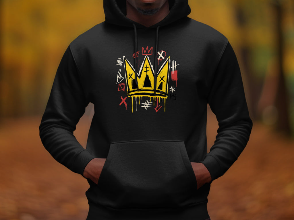 Black hoodie with a yellow crown graphic and red and white scribbled accents.