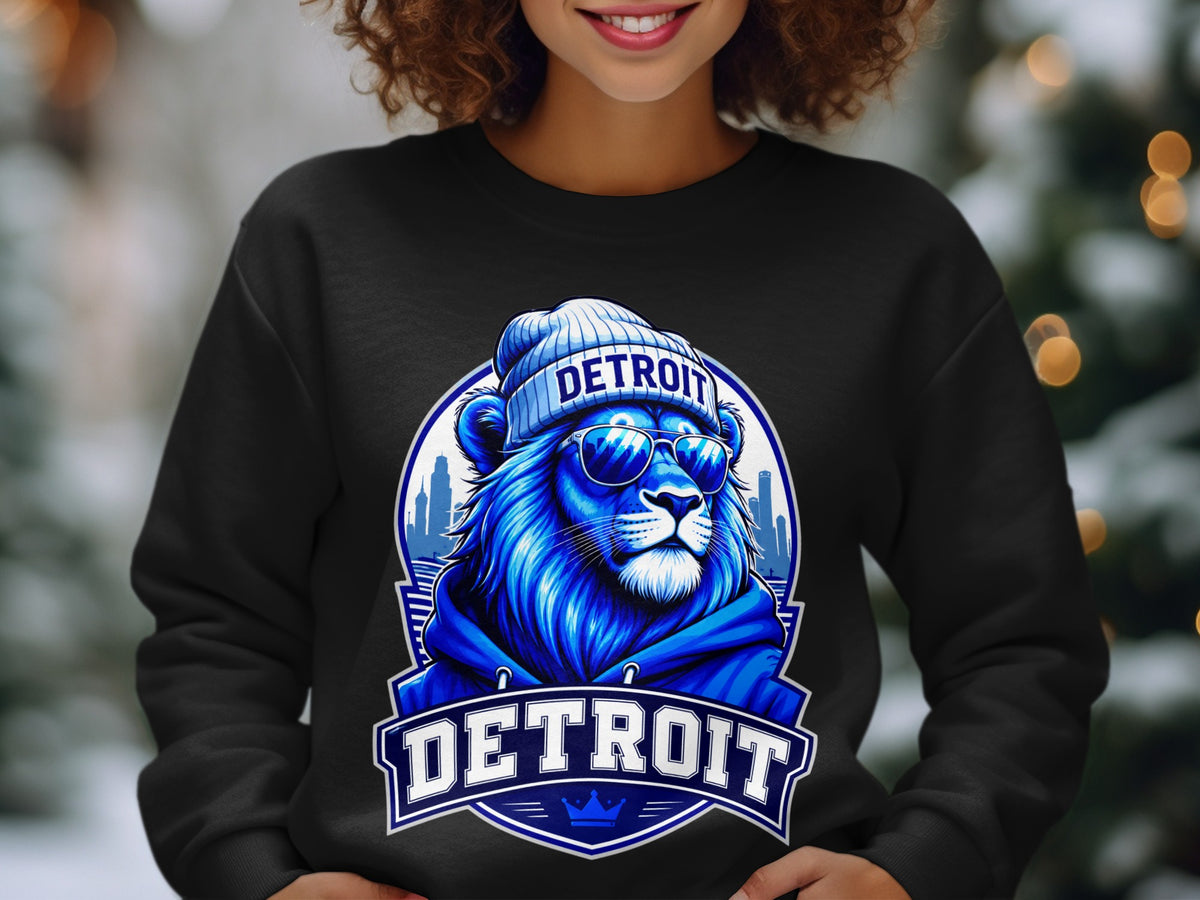 Black sweatshirt with blue lion graphic wearing beanie and sunglasses, text reads DETROIT.