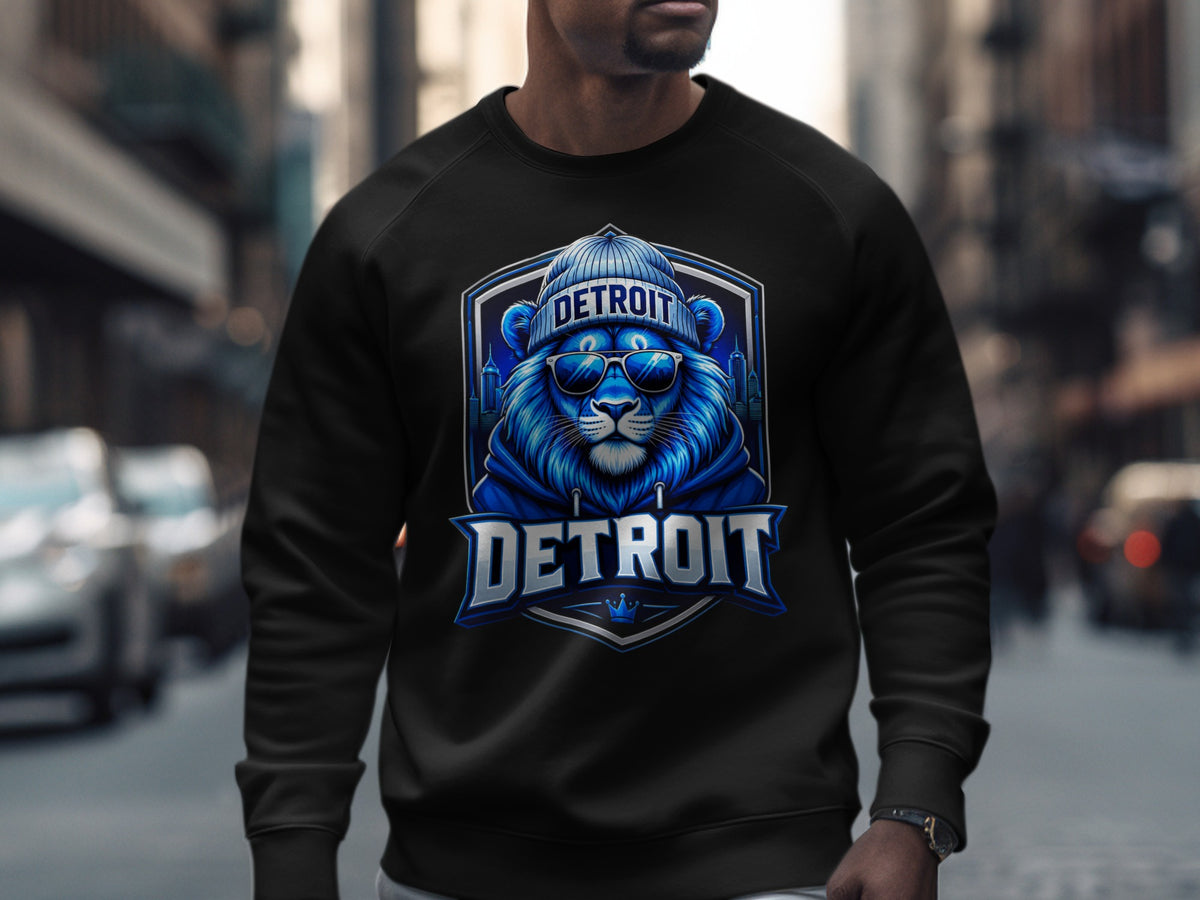 Black sweatshirt with a blue lion graphic wearing a beanie and sunglasses with "DETROIT" text.