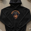 Black hoodie with a portrait and "WHAT IT IS, POPS?!" text.